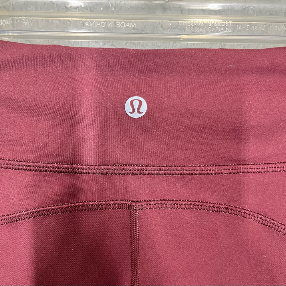 Lululemon Invigorate 25” maroon leggings - Picture 8 of 9